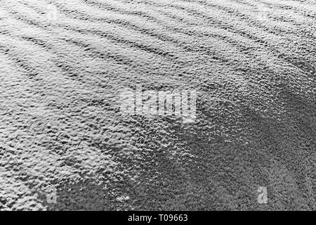 Silver light grey fine sand texture background close up copy space Stock Photo