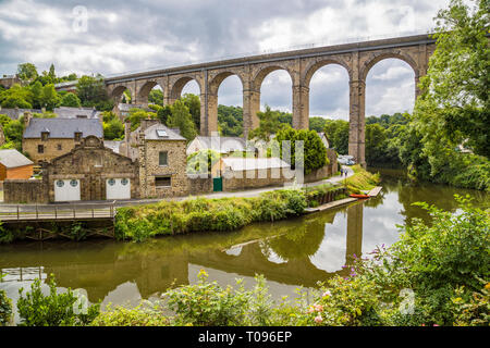 Beautiful view of the historic town of Dinan with Rance river with dramatic cloudscape, Cotes-d'Armor department, Bretagne, northwestern France Stock Photo