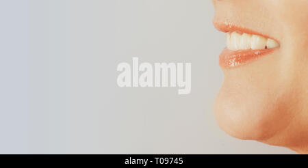macro detail shot of human lips and smile