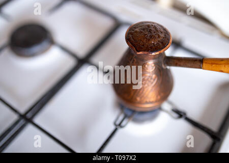 Turka With Coffee On The Gas Stove. Stock Photo, Picture and