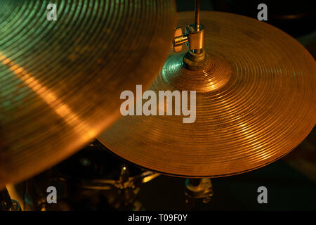 Studio shot of rock band drum set, focus on cymbals Stock Photo