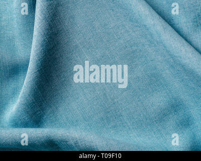 Modern soft jeans blouse texture close up. Lyocell or tencel pattern - modern natural cellulose fabric blue denim color. Can use for design or text. Copy space Stock Photo