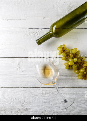 Picture on top of wine glass with wine, grapes, bottle Stock Photo
