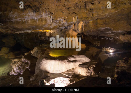 Inside of cave with feature known as La Grande Fontaine / The Giant Fountain ; Caves of La Balme ( Bat caves ), La Balme-les-Grottes, Isère department, France. Stock Photo