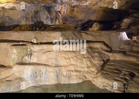 Inside of cave with feature known as La Grande Fontaine / The Giant Fountain ; Caves of La Balme ( Bat caves ), La Balme-les-Grottes, Isère department, France. Stock Photo