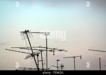 Analog TV antennas against clear sky Stock Photo