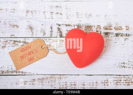 Red heart on a wooden table Stock Photo