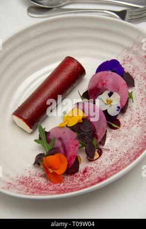 Goats cheese mousse with barbecue beetroot, hazelnuts and beetroot and ...