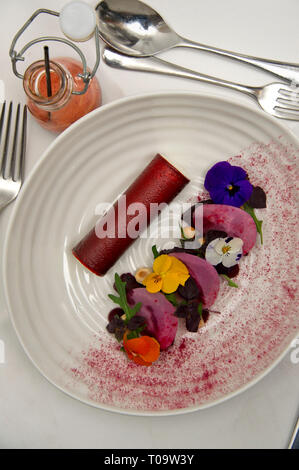 Goats cheese mousse with barbecue beetroot, hazelnuts and beetroot and ...
