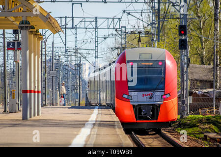 . Russian electric train on rails . The railways of Russia, Russia, Leningrad region, Pargolovo station, May 8, 2018, a tour of the cities and village Stock Photo