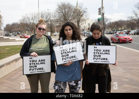 Washington, United States Of America. 15th Mar, 2019. 'You are stealing our future' read the signs. Young demonstrators joined the International Youth Climate Strike at the U.S. Capitol West Lawn, in Washington, DC on Friday, March 15, 2019. Students around the world walked out of school and into the streets to demand action to prevent further global warming and climate change. (Photo by Jeff Malet) Photo via Credit: Newscom/Alamy Live News