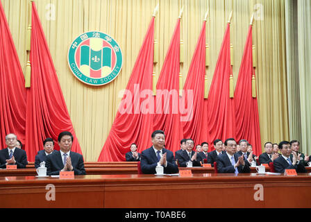 (190319) -- BEIJING, March 19, 2019 (Xinhua) -- Chinese President Xi Jinping and other Communist Party of China and state leaders Li Keqiang, Li Zhanshu and Wang Huning attend the opening ceremony of the eighth congress of the China Law Society and extend their congratulations to the congress in Beijing, capital of China, March 19, 2019. (Xinhua/Ju Peng) Stock Photo