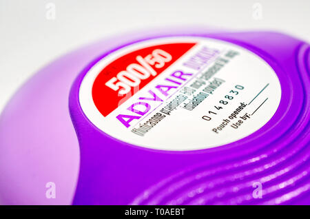 Purple Asthma Inhaler on white background Stock Photo - Alamy