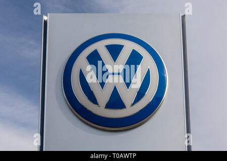 VW Volkswagen logo sign symbol outside a car dealership Stock Photo