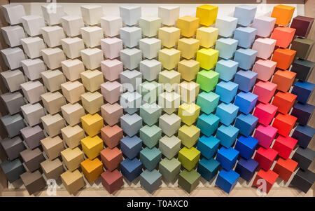 Color palette. Display with colored paint pantones for interior decoration. Multicolored square cube bars painted with paints of all colors Stock Photo