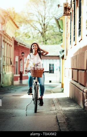 Premium Photo  Cheerful young woman wearing summer clothes walking on a  city street with bicycle