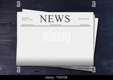 news papers on table Stock Photo