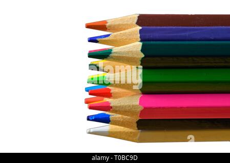 Textured wood colored pencils. Colored pencils macro. Assortment of colored wood drawing pencils on white background. Copy space Stock Photo