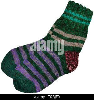 Warm green grey violet purple striped knitted wool camp socks, large detailed isolated macro closeup, gray burgundy red woolen pair detail Stock Photo
