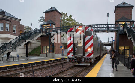 Rainy evening on the platform of the Metra train stop in Winnetka, Illinois Stock Photo