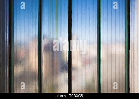 Texture details of blurry reinforced glass, close-up view. Stock Photo
