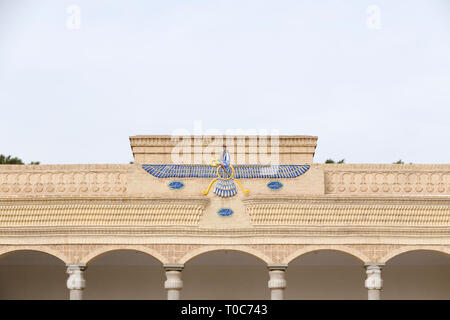 Fravahar symbol above the entrance to the Ateshkadeh, a Zoroastrian Fire Temple, Yazd,  Iran Stock Photo