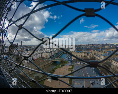 Great panoramic view of Paris from Notre Dame in a beautiful day. Its also visible most popular Parisian monuments, Eiffel tower, Louvre museum. Stock Photo