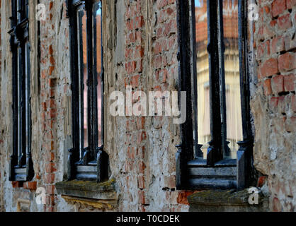 Old style, windows on the brick wall Stock Photo