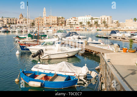 BARI, ITALY, NOVEMBER 07 2018: Picturesque view of harbour, full of fishing boats Stock Photo