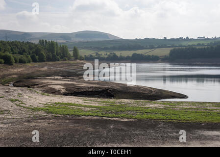 Low water levels in the drought of 2018 at Bottom's reservoir, Longdendale, Derbyshire, England. Stock Photo