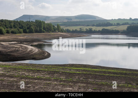 Low water levels in the drought of 2018 at Bottom's reservoir, Longdendale, Derbyshire, England. Stock Photo