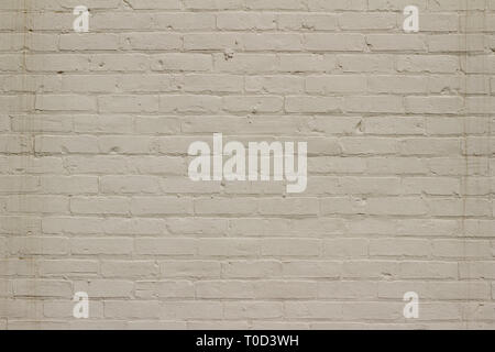 Close up of a grungy old white painted brick wall background with stains Stock Photo