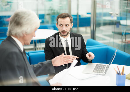 Mature Business Partners in Meeting Stock Photo