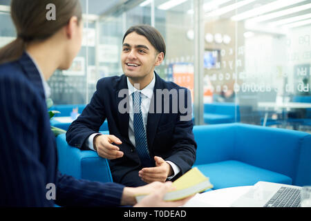 Young Entrepreneur in Meeting Stock Photo