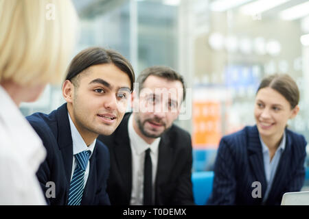 Middle-Eastern Young Man in Meeting Stock Photo