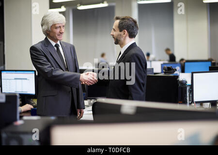 Business Partners Shaking Hands Stock Photo