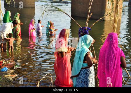 Woman praying, Chhath puja festival, Vapi, Valsad, Gujarat, India, Asia Stock Photo