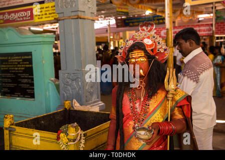 Man Hindu God dress, Mutharamman temple, Kulasai, Tamil Nadu, India, Asia Stock Photo