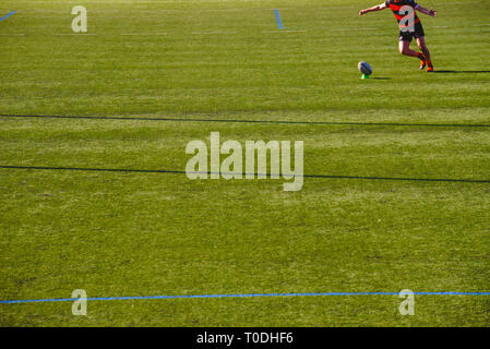 Valencia, Spain - January 19, 2019: Rugby player kicking the ball. Stock Photo