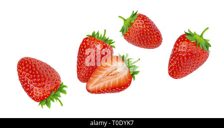 Falling strawberries isolated on white background Stock Photo