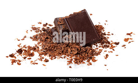 Broken chocolate. Heap of ground and grated chocolate isolated on white background Stock Photo