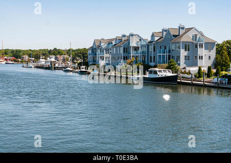 View of the Mystic Seaport with boats and houses, Connecticut Stock Photo
