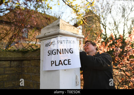 A sign is placed outside Bedford Hall in Thorney, Peterborough, where voters are being given the opportunity to sign a petition to force a by-election following the conviction of local MP Fiona Onsanya for lying about a speeding offence. Stock Photo