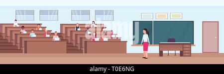 students sitting at desks and listening teacher in auditorium lecture hall theater room interior modern university classroom with rows of seats and Stock Vector