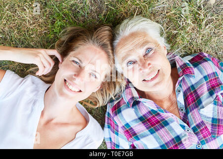 generations of a family grandmother mother young naked child shanty