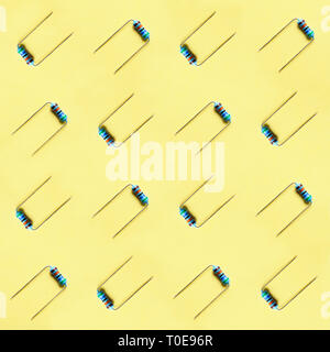 Resistor disposed in artistic pattern on yellow background, ideal to print on fabric Stock Photo