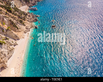 Tourist ship on the Egremni beach, Lefkada, Greece. Stock Photo