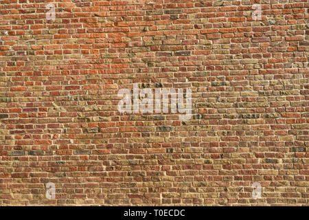 Old wall from many red bricks as background texture Stock Photo