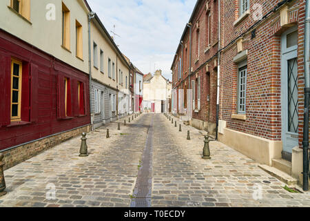 Empty narrow street during the day in the historic center of Amiens, France Stock Photo