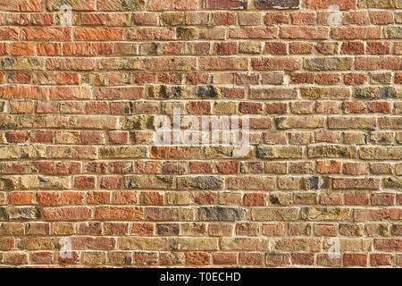 Old wall or brick wall from many red bricks as a background texture Stock Photo